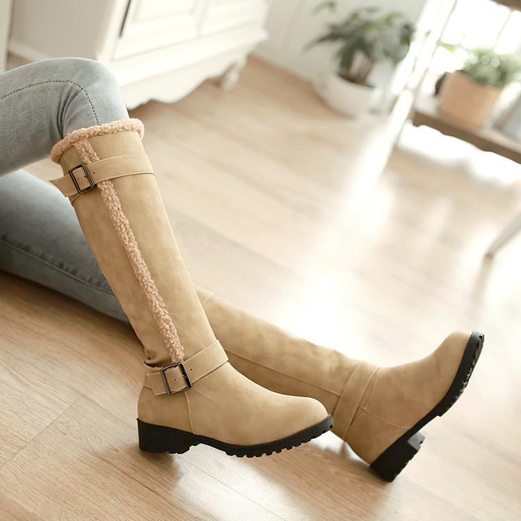 Elegant plush lined tall snow boots with buckle strap